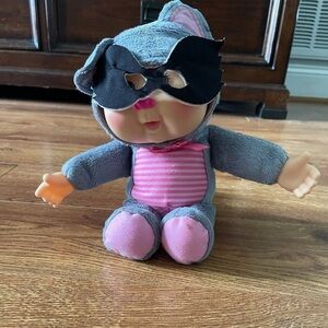 Cabbage Patch baby doll dressed as a raccoon